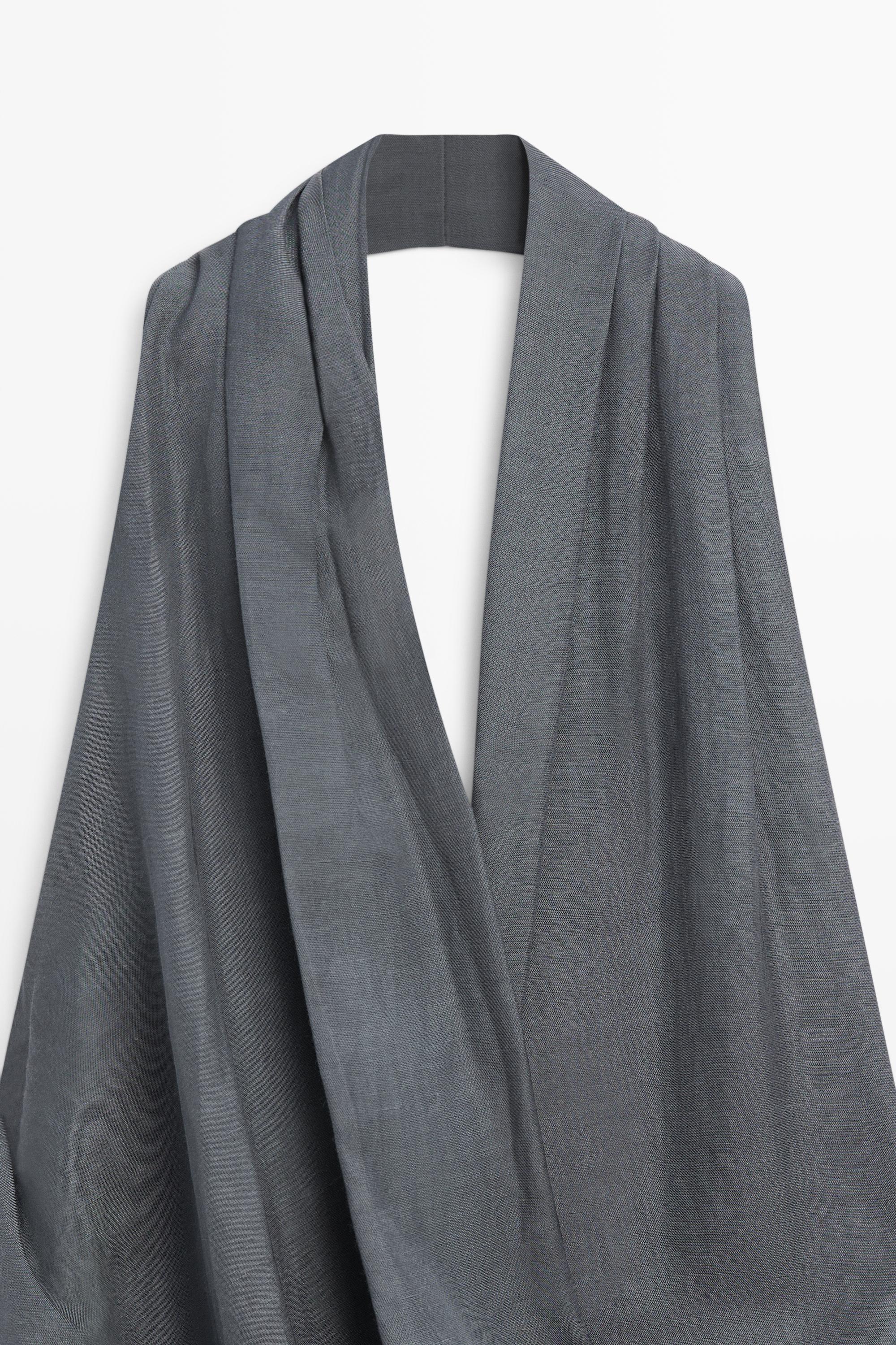 Asymmetric draped jumpsuit